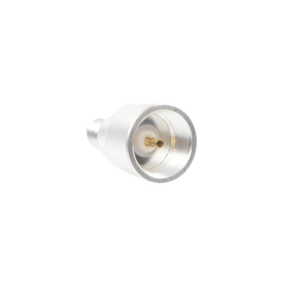Adaptador UNIDAPT Hembra a SMA Hembra Inverso. Plata / Oro / Teflón. | PT-4000-134